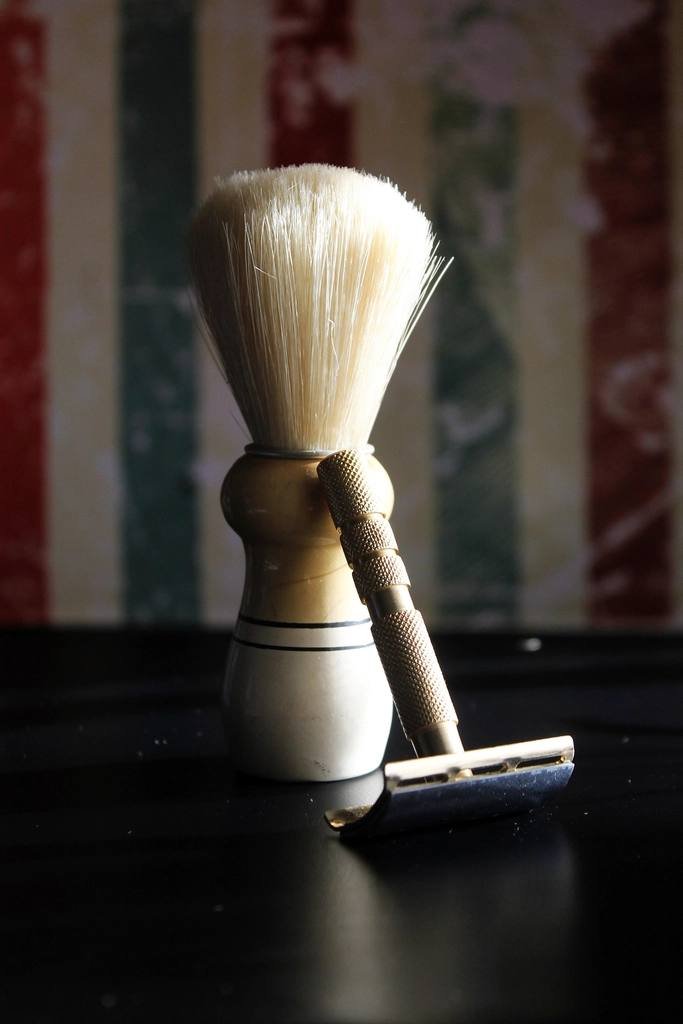 A shaving brush and razor
