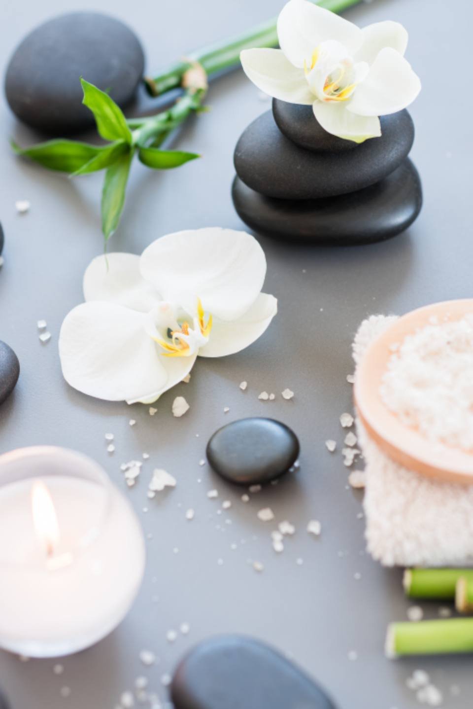 Spa stones, orchids and a candle