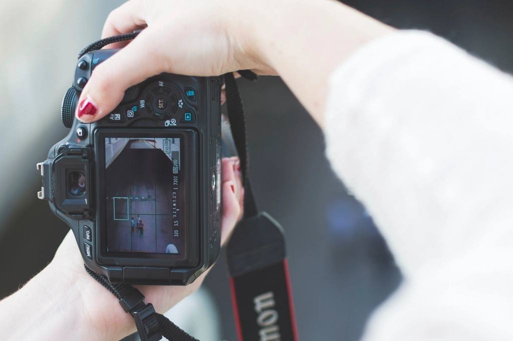 A camera held in two hands