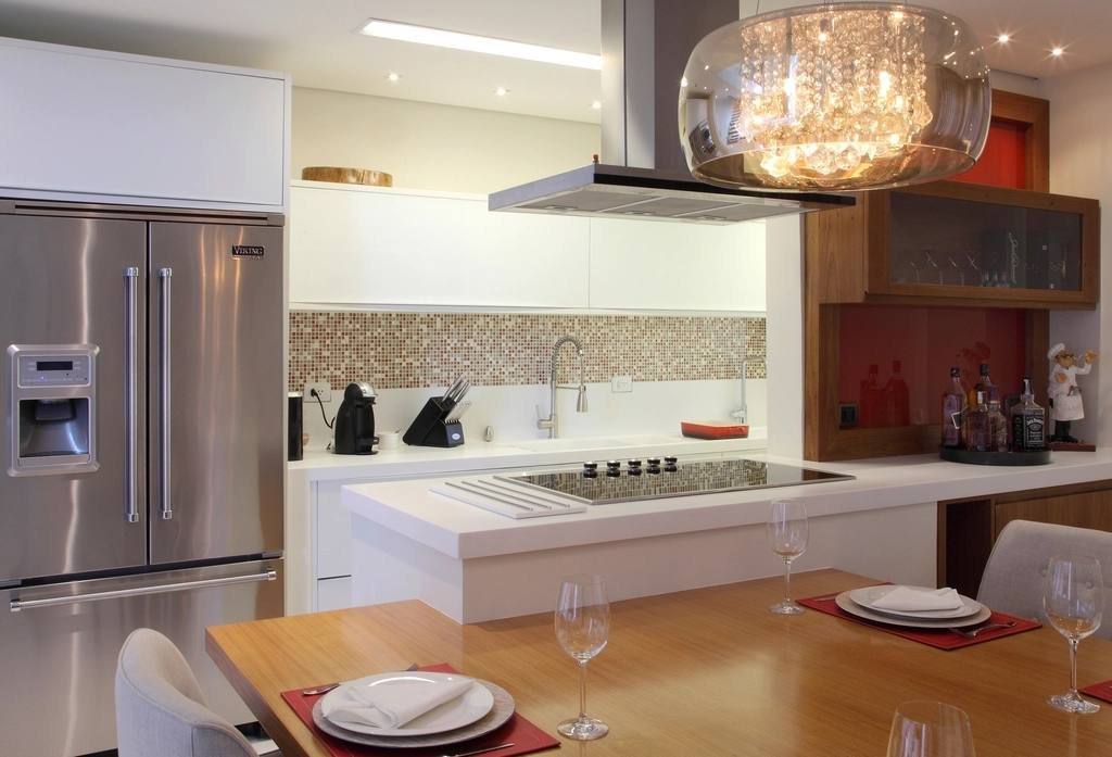 A modern kitchen with a dining table