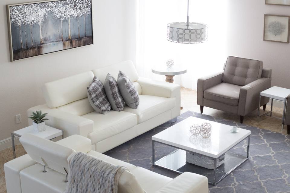 A bright living room with a white sofa