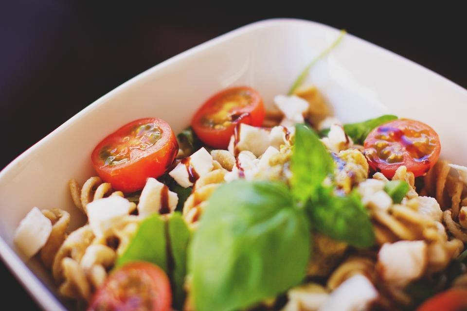 Pasta salad with tomatoes and basil